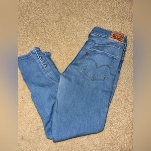 Levi’s Shaping Skinny Jeans 311 with Button Snaps at bottom